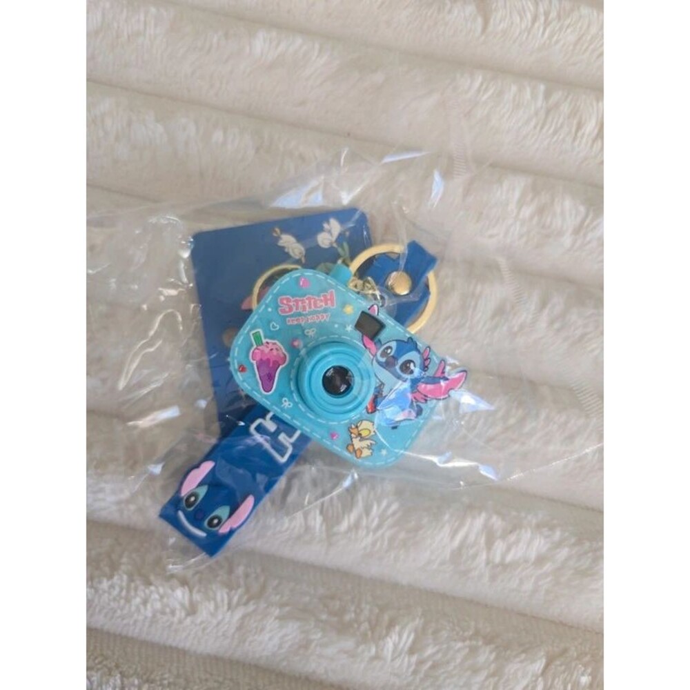 Blue Stitch camera keychain with wrist
strap